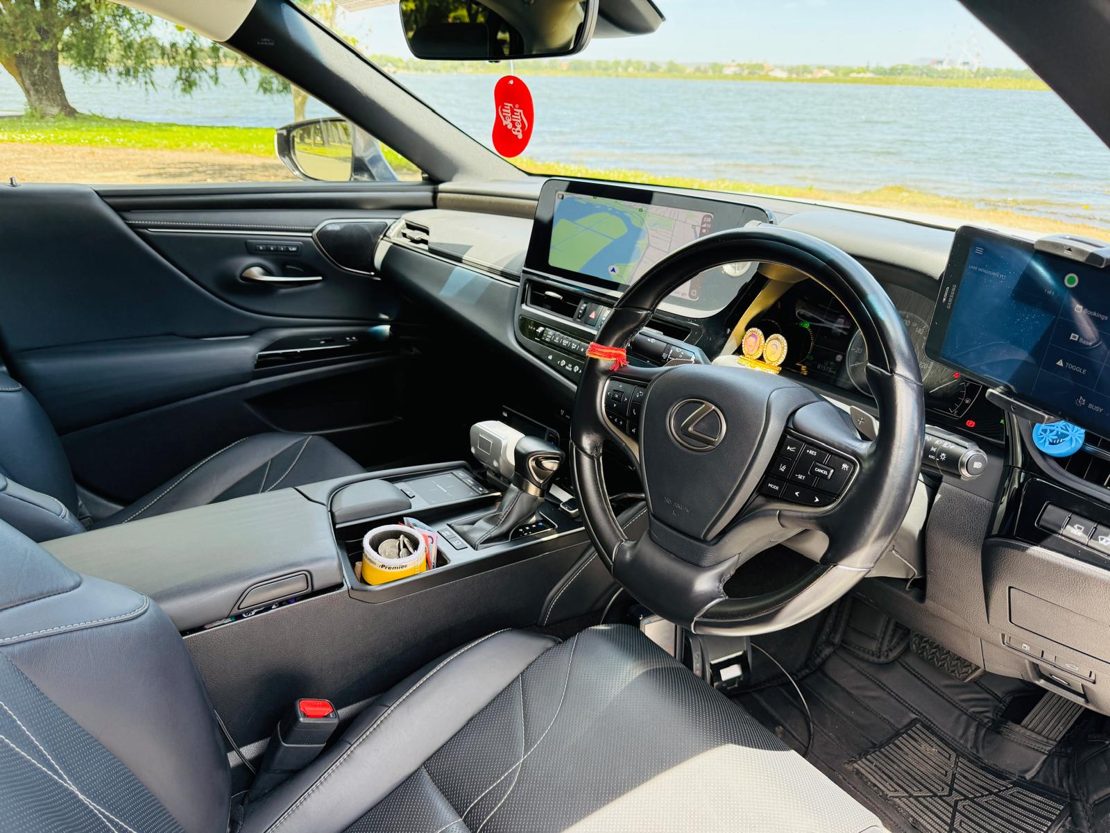 Lexus ES300h cockpit with twin 12.3-inch displays and leather interior