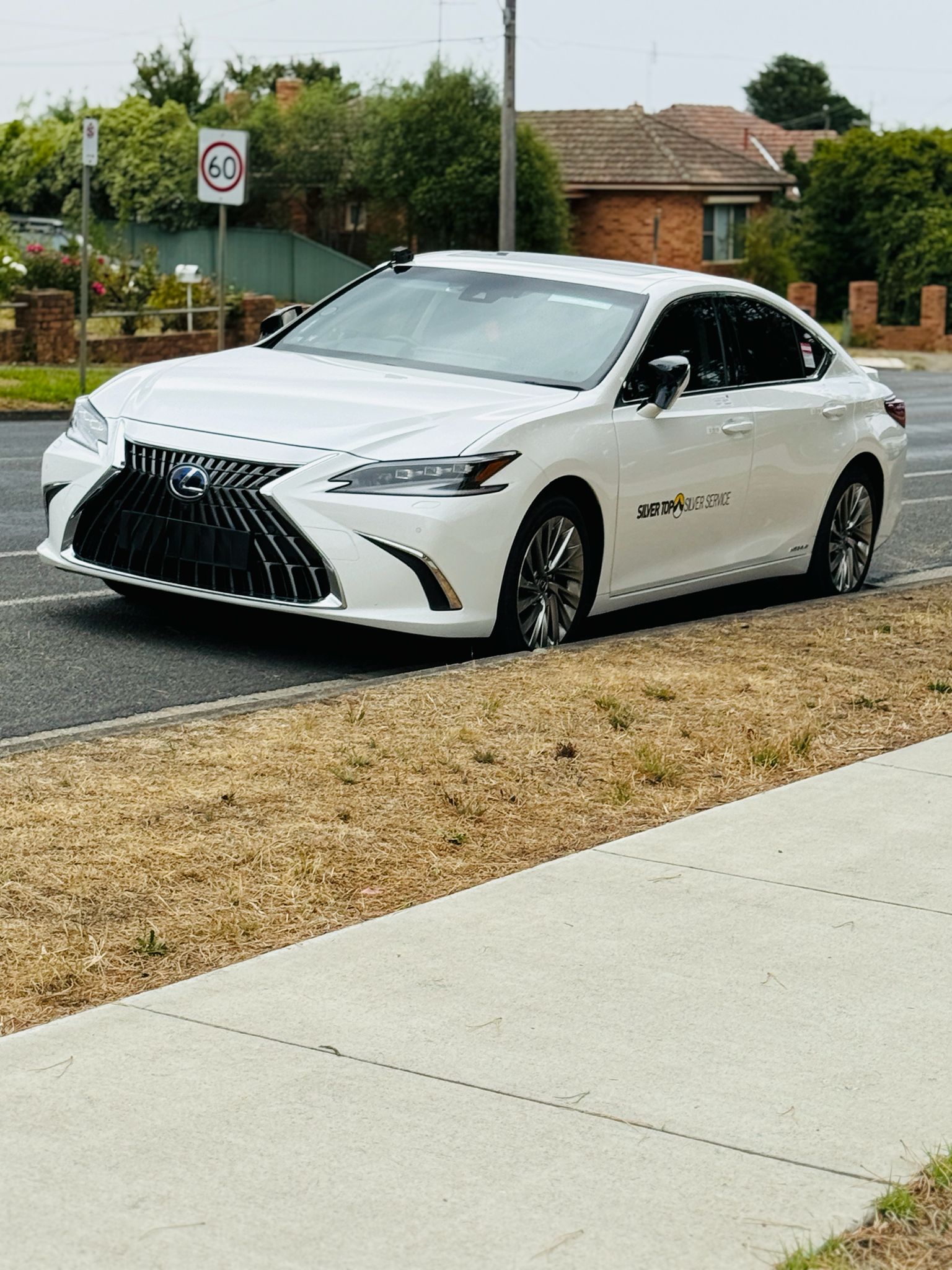 Lexus ES300h luxury taxi on a Ballarat street
